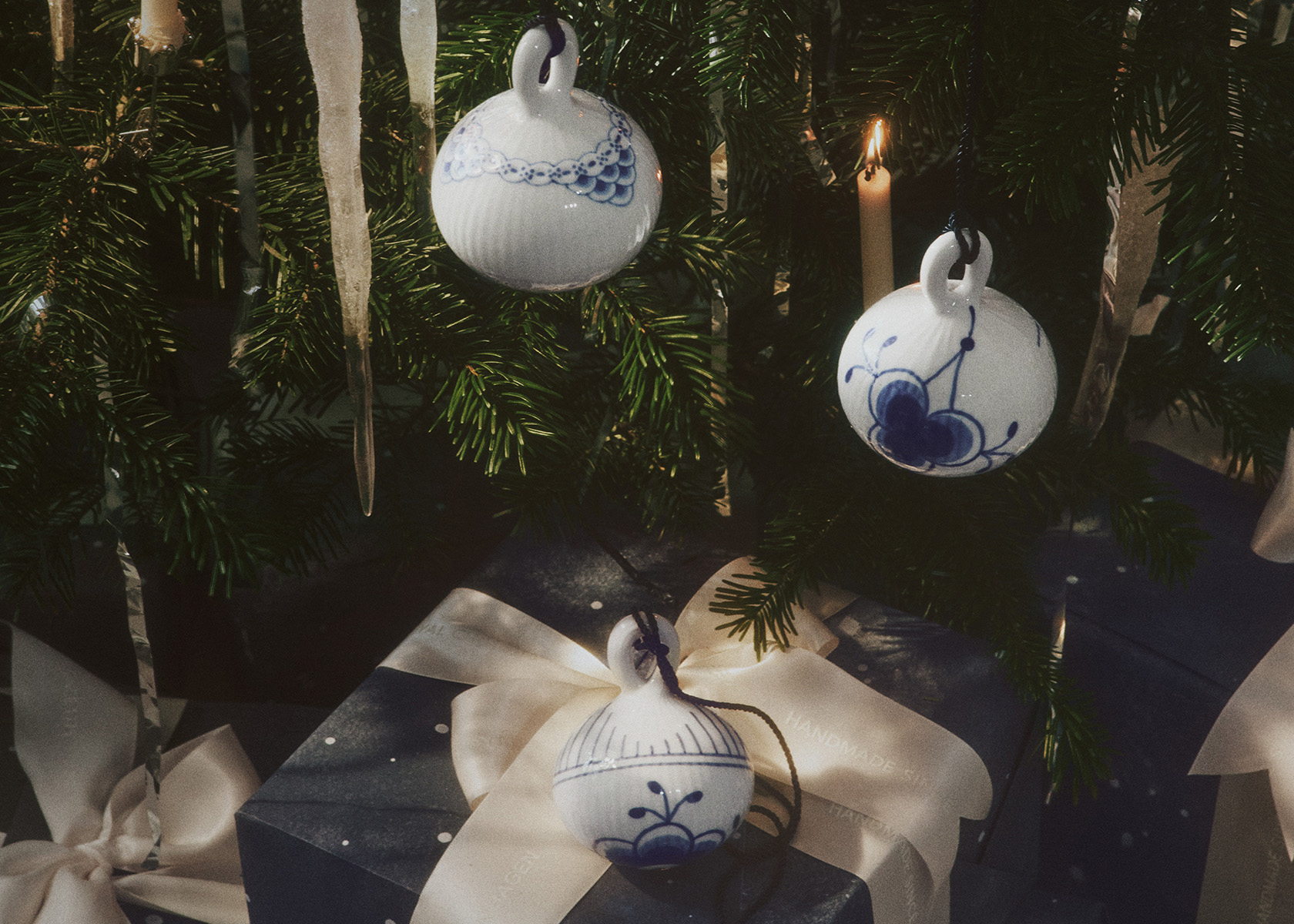 Christmas decorations from Royal Copenhagen - three Christmas Baubles on a tree
